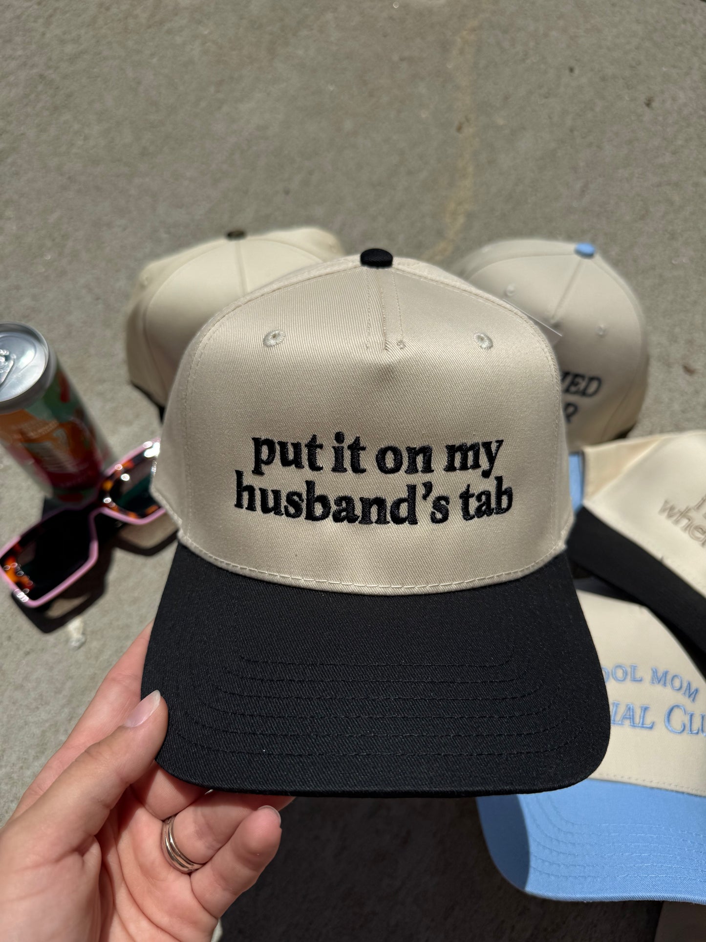 Put It On My Husband’s Tab Trucker Hat
