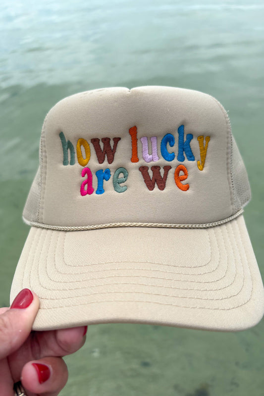 HOW LUCKY ARE WE Trucker Hat
