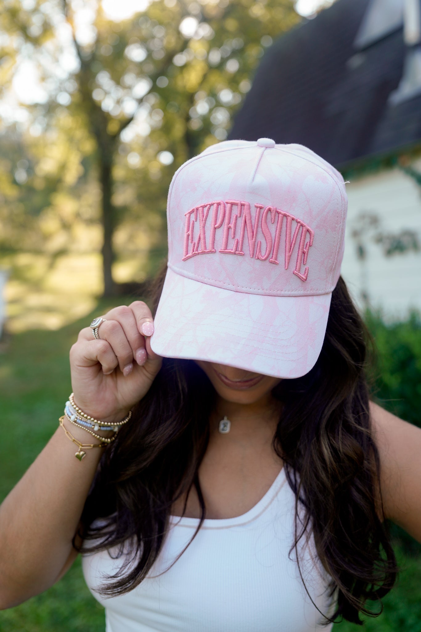 EXPENSIVE pink camo trucker hat